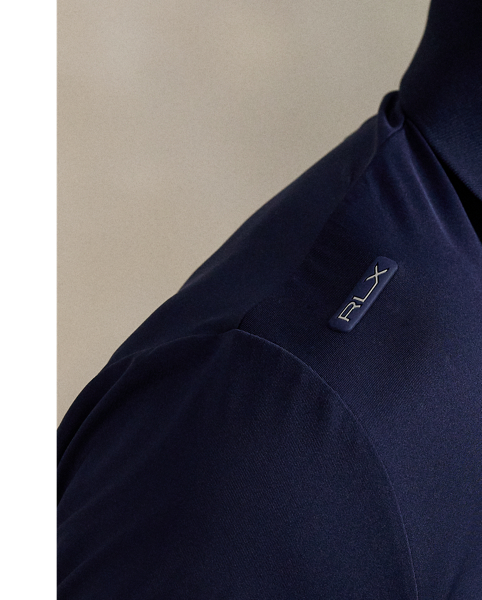 This Polo shirt is crafted from stretch jersey, which is both lightweight and breathable. Its moisture-wicking properties help keep you cool and comfortable all day long.