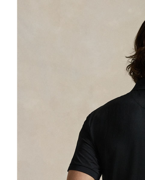 This Polo shirt is crafted from stretch jersey, which is both lightweight and breathable. Its moisture-wicking properties help keep you cool and comfortable all day long.