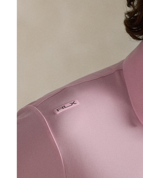 This Polo shirt is crafted from stretch jersey, which is both lightweight and breathable. Its moisture-wicking properties help keep you cool and comfortable all day long.