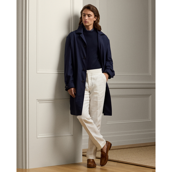 This car coat is crafted in Italy with a coated wool-blend fabric that is both water- and wind-resistant. Inspired by utilitarian overcoats, the lightweight layer is lined at the body with warm brushed flannel.