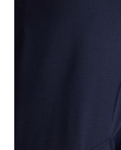 This car coat is crafted in Italy with a coated wool-blend fabric that is both water- and wind-resistant. Inspired by utilitarian overcoats, the lightweight layer is lined at the body with warm brushed flannel.