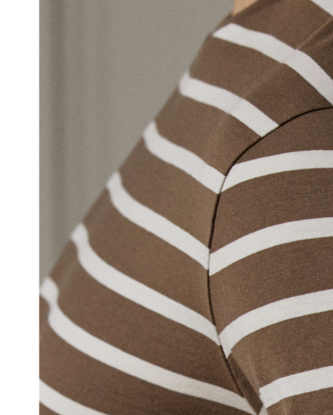 In luxuriously soft cotton lisle, this crewneck T-shirt is rendered in both a custom-developed striped pattern and colour palette.