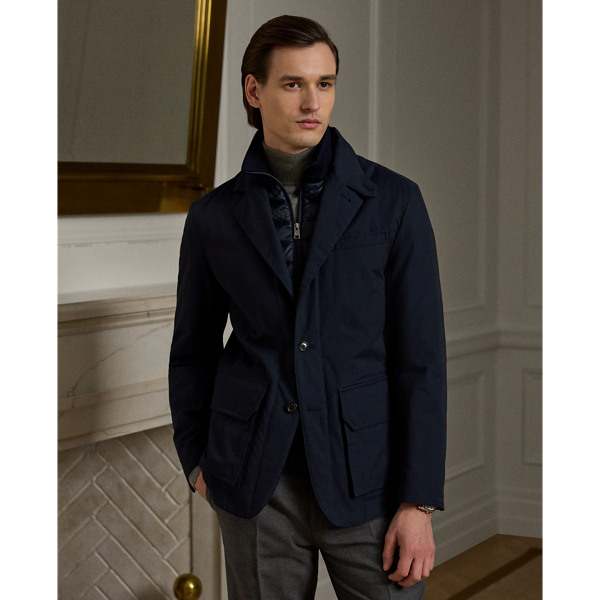 This Italian-crafted jacket achieves a layered look without the bulk thanks to a rib-knit mockneck with quilted, down-filled trim on the placket. Its blazer-inspired shell is made from a water-resistant fabric.