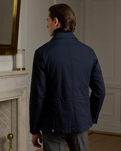 This Italian-crafted jacket achieves a layered look without the bulk thanks to a rib-knit mockneck with quilted, down-filled trim on the placket. Its blazer-inspired shell is made from a water-resistant fabric.