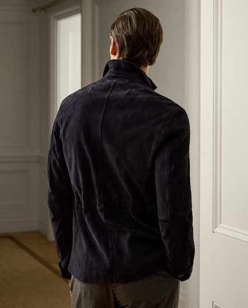 This jacket demonstrates Purple Label's dedication to sartorial excellence through expert Italian craftsmanship and luxuriously soft suede. The distinguished design is elevated with carefully considered details, including a " Ralph Lauren Lauren"-debossed collar stand, creating a sophisticated interpretation of utilitarian style.