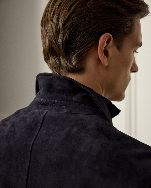 This jacket demonstrates Purple Label's dedication to sartorial excellence through expert Italian craftsmanship and luxuriously soft suede. The distinguished design is elevated with carefully considered details, including a " Ralph Lauren Lauren"-debossed collar stand, creating a sophisticated interpretation of utilitarian style.