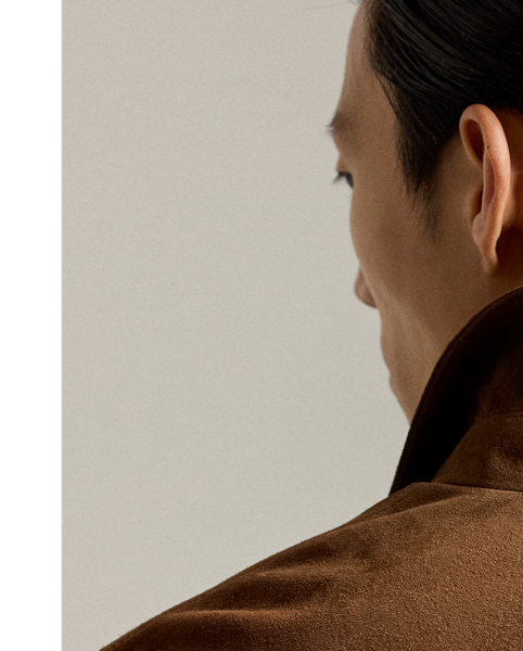 This trucker jacket is expertly crafted in Italy from supple suede and finished with metal " Ralph Lauren Lauren"-engraved buttons.