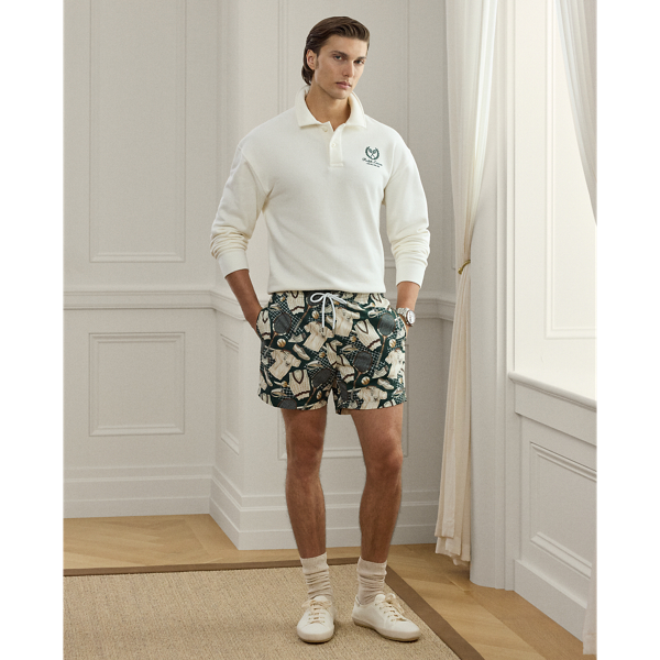 Defined by a relaxed silhouette, the Amalfi is crafted in Italy with a fine fabric that is also used for its travel pouch. Its lightweight cloth was custom-developed with Mantero, a Como-based mill that is renowned for its striking prints. The motif of tennis apparel and equipment draws inspiration from one of our vintage ties and has become a  Ralph Lauren Lauren signature.