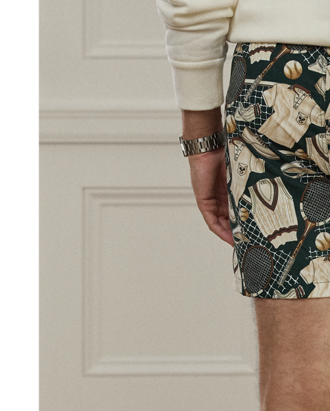 Defined by a relaxed silhouette, the Amalfi is crafted in Italy with a fine fabric that is also used for its travel pouch. Its lightweight cloth was custom-developed with Mantero, a Como-based mill that is renowned for its striking prints. The motif of tennis apparel and equipment draws inspiration from one of our vintage ties and has become a  Ralph Lauren Lauren signature.