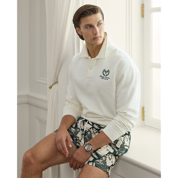 This sweatshirt is expertly crafted in Italy with sumptuously soft cotton-and-cashmere fleece. It is intricately embroidered with a bespoke tennis-inspired crest and detailed with genuine mother-of-pearl buttons that were custom-developed with the  Ralph Lauren Lauren logo.