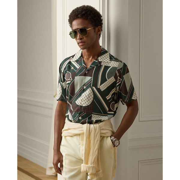 Artfully composed of tennis courts and equipment, this shirt's abstract motif was custom-developed specifically for Purple Label. It is expertly crafted in Italy using a lightweight fabric that offers a soft drape and exceptional colour brilliance. Genuine mother-of-pearl buttons showcase Purple Label's dedication to elevated details.