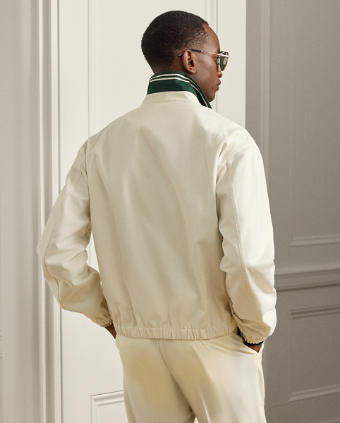 Expertly crafted in Italy, this medium-weight layer elevates the classic silhouette of a vintage tennis jacket with cotton-and-cashmere twill. An engineered stripe-print collar, a custom-developed crest and signature hardware reflect Purple Label's dedication to distinctive details.