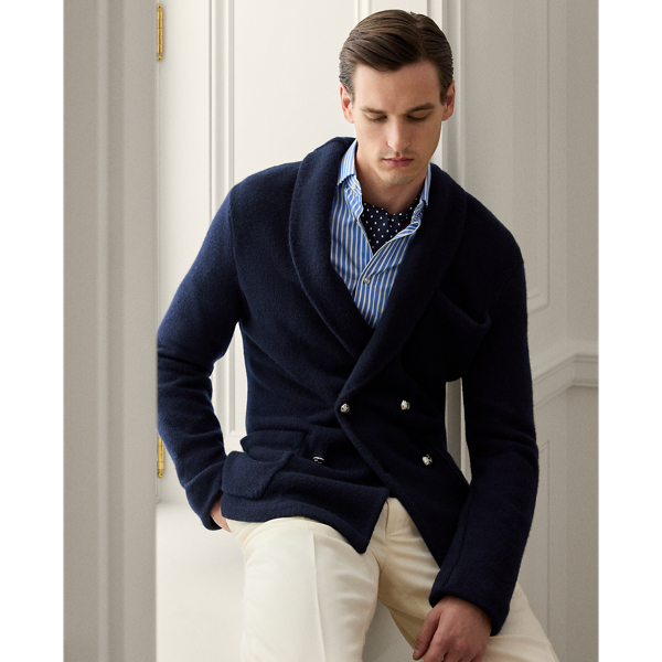 To create this Italian-made layer,  Ralph Lauren Lauren reinterprets the silhouette of a Purple Label shawl tuxedo with thick-gauge cashmere yarn. Custom-developed metal buttons give it a bespoke finish.