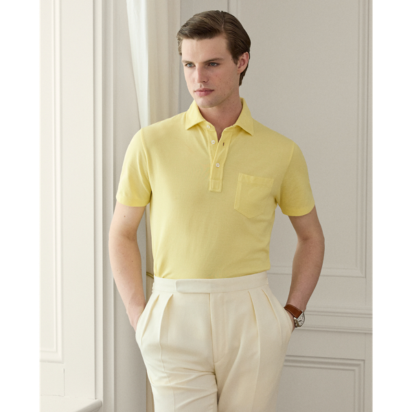 This Purple Label Polo shirt is crafted with custom-developed cotton piqué and washed to achieve an incredibly soft texture. At the left sleeve, it is intricately embroidered with " Ralph Lauren Lauren" in script letters.