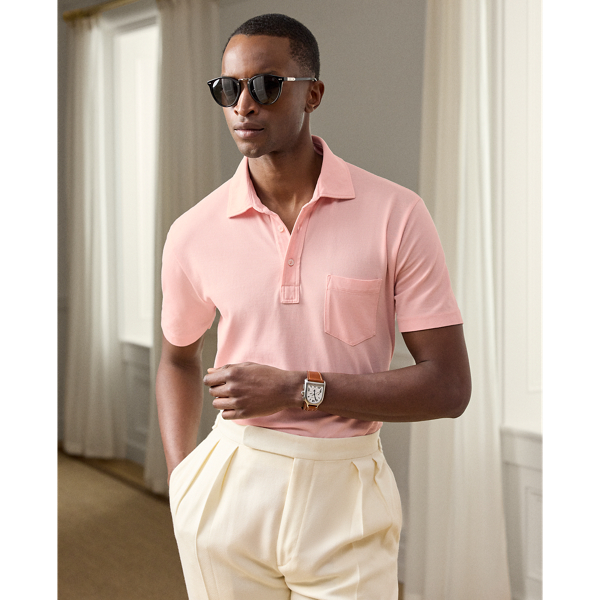 This Purple Label Polo shirt is crafted with custom-developed cotton piqué and washed to achieve an incredibly soft texture. At the left sleeve, it is intricately embroidered with " Ralph Lauren Lauren" in script letters.