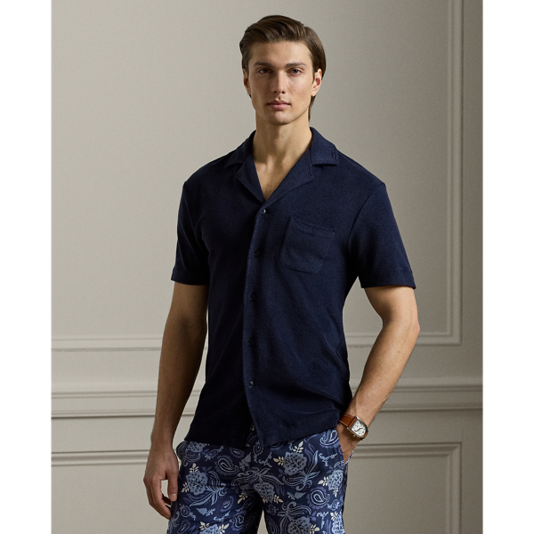 Expertly crafted in Portugal, this Polo shirt exemplifies casual elegance with its lightweight cotton-blend terry fabric, which is both comfortable and luxurious. It is meticulously embroidered with our signature " Ralph Lauren Lauren" script logo on the right sleeve.