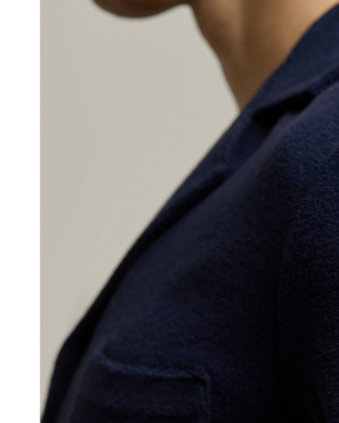 Expertly crafted in Portugal, this Polo shirt exemplifies casual elegance with its lightweight cotton-blend terry fabric, which is both comfortable and luxurious. It is meticulously embroidered with our signature " Ralph Lauren Lauren" script logo on the right sleeve.