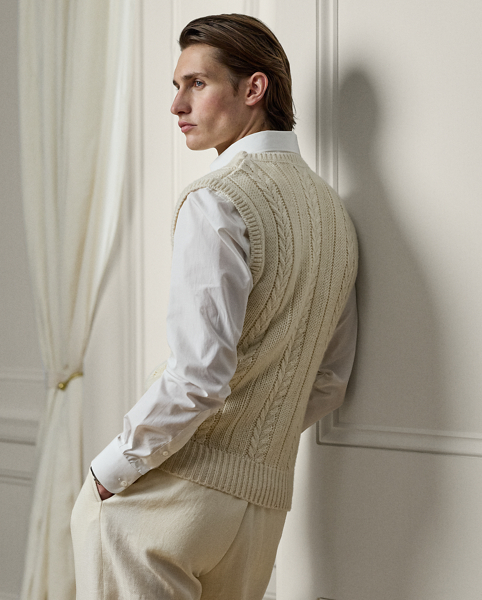 Meticulously crafted in Italy, this sleeveless jumper represents the pinnacle of textile artistry, where time-honoured cable- and rib-knit techniques are interpreted with some of the world's most covetable fibres – luxurious cashmere, textured tussah silk and lightweight linen.