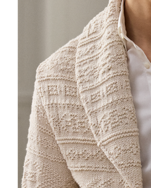 Masterfully crafted in Italy, this shawl-collar cardigan exemplifies  Ralph Lauren Lauren Purple Label's commitment to unparalleled luxury, showcasing an intricate textured-knit technique rendered in a refined cotton-and-wool blend.