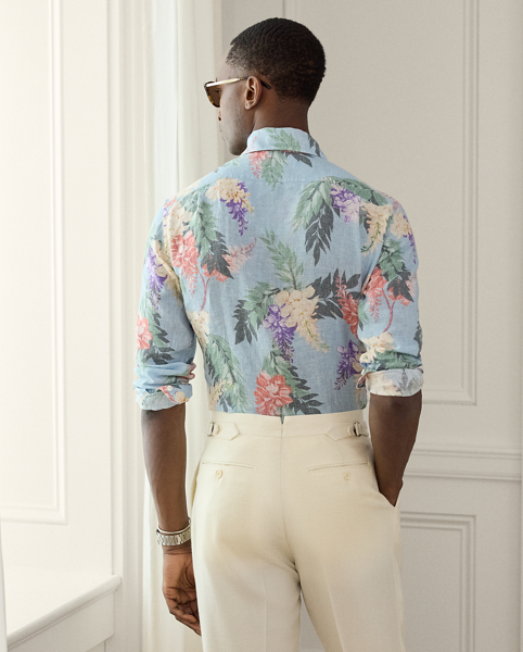 This shirt is expertly crafted in Italy and detailed with genuine mother-of-pearl buttons. Its floral linen fabric was custom-developed with Mantero, an established mill in Como that is renowned for its striking prints.