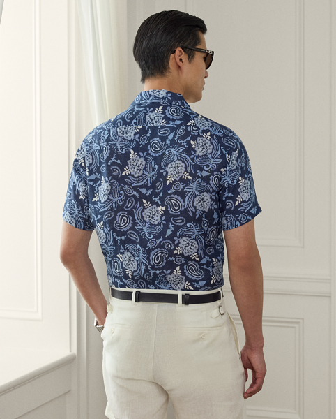 This lightweight shirt is expertly crafted in Italy and detailed with genuine mother-of-pearl buttons. Its custom-developed cloth is printed with a paisley motif, which draws inspiration from Indian choppa silk.