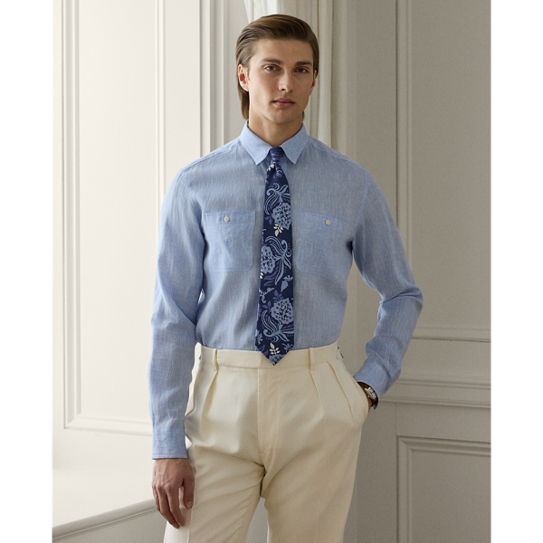 This Italian-crafted shirt masterfully balances form and function with a utilitarian-inspired silhouette rendered in lightweight linen chambray. Corozo buttons provide a subtle yet sophisticated finishing touch to this flawless example of casual elegance.