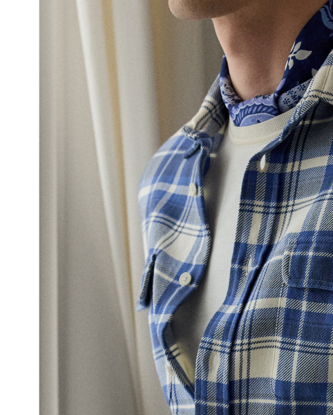 Expertly crafted from Italian cotton twill, this plaid shirt artfully balances utilitarian inspiration with modern refinement. The meticulously tailored silhouette honours functional heritage style, while exceptional fabric quality and bespoke corozo buttons elevate it to a new level.