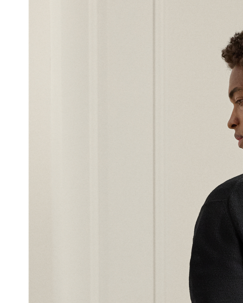 This jumper pays homage to  Ralph Lauren Lauren's legendary Polo shirt with its distinctive double-piqué construction, which echoes the iconic mesh texture. The use of worsted wool yarn from Italy demonstrates Purple Label's dedication to superior materials and impeccable craftsmanship.