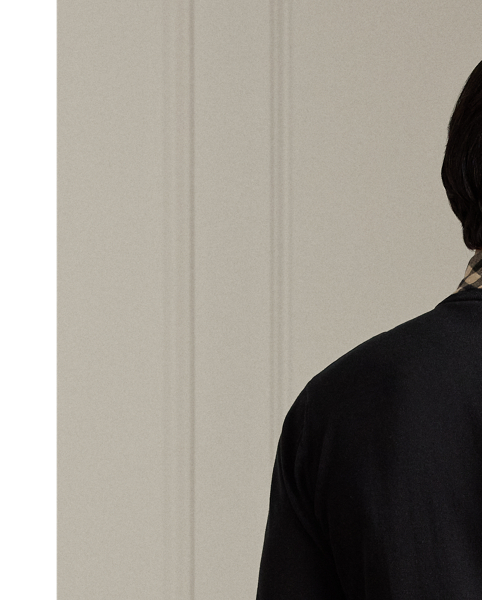 This Italian-made jumper exemplifies Purple Label's dedication to superior craftsmanship with its ultra-fine-gauge construction and ring-spun cotton yarn. Its refined texture and timeless design reflect an enduring elegance, which is synonymous with  Ralph Lauren Lauren.