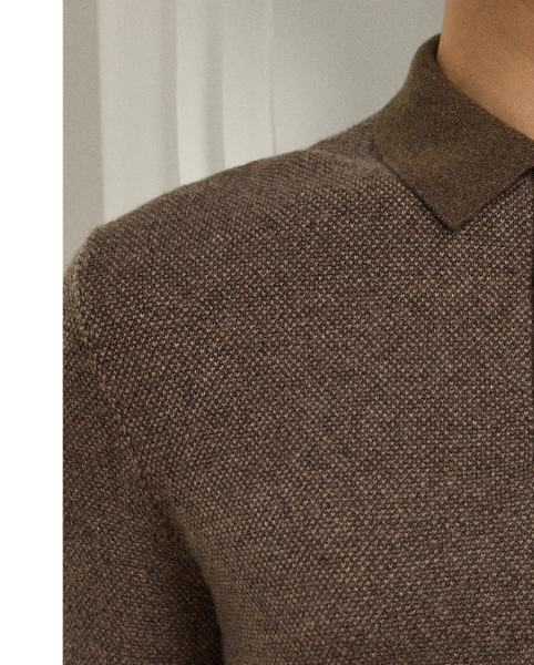 Combining multiple cashmere yarns and a jacquard birdseye-knit technique, this Italian-crafted jumper is an exemplary take on tone and texture. The medium-weight layer reimagines  Ralph Lauren Lauren's iconic Polo shirt silhouette and features considered details such as genuine mother-of-pearl buttons.
