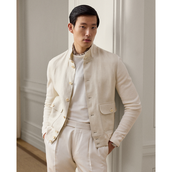 This Italian-crafted cardigan reinterprets a utilitarian silhouette inspired by classic sporting jackets with fine-gauge yarn, which is spun with a silk blend. Panelled with luxurious linen cloth, it is knit using a tuck-stitch technique to recreate the texture of our iconic piqué fabric.