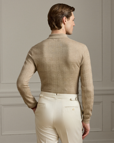 Uniting multiple fine-gauge cashmere yarns and a jacquard-knit technique, this Italian-crafted jumper is an exemplary take on tone and texture. The lightweight layer reimagines Ralph Lauren Lauren's iconic Polo shirt silhouette and features considered details such as genuine mother-of-pearl buttons. Its tonal plaid pattern draws inspiration from a woven fabric that is used in the Purple Label collection.