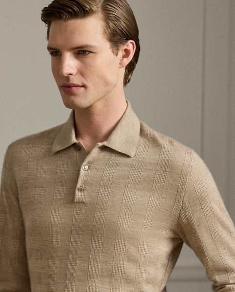Uniting multiple fine-gauge cashmere yarns and a jacquard-knit technique, this Italian-crafted jumper is an exemplary take on tone and texture. The lightweight layer reimagines Ralph Lauren Lauren's iconic Polo shirt silhouette and features considered details such as genuine mother-of-pearl buttons. Its tonal plaid pattern draws inspiration from a woven fabric that is used in the Purple Label collection.