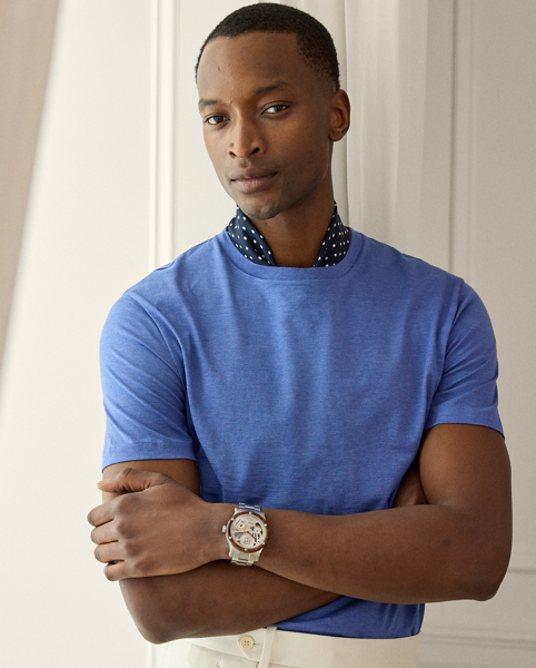 Elevating the classic crewneck silhouette, this sophisticated T-shirt is meticulously crafted from sumptuous cotton lisle in a custom-developed colour. The attention to detail is exemplified through signature Purple Label touches, such as grosgrain trim in our namesake hue on the interior and elegant " Ralph Lauren Lauren" embroidery.