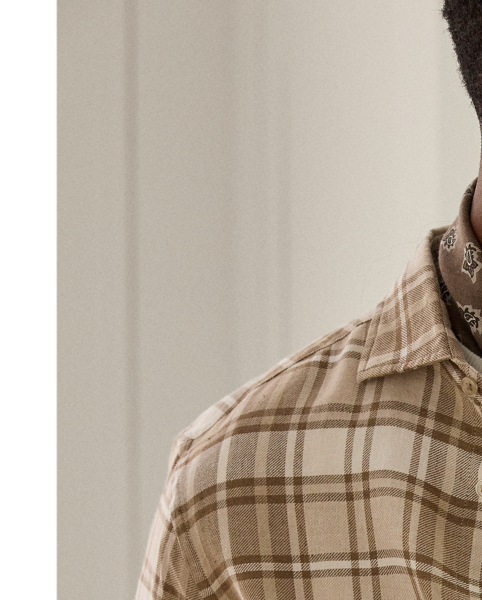 Exquisitely crafted in Italy with a linen-and-cotton blend, this lightweight shirt exemplifies Purple Label's commitment to superior crafting and enduring elegance. A custom-developed plaid pattern rendered in the season's signature palette and genuine mother-of-pearl buttons elevate this garment to an exemplar of sophisticated style.