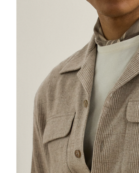 Developed in collaboration with Ireland's legendary Magee 1866 mill – a distinguished  Ralph Lauren Lauren partner for more than five decades – this shirt's fabric showcases a luxurious blend of fine wool, silk and cashmere. Its tonal palette and Glen plaid pattern were specially created to Purple Label's exacting standards of excellence. It features a vintage-inspired silhouette that is realised through impeccable Italian crafting.