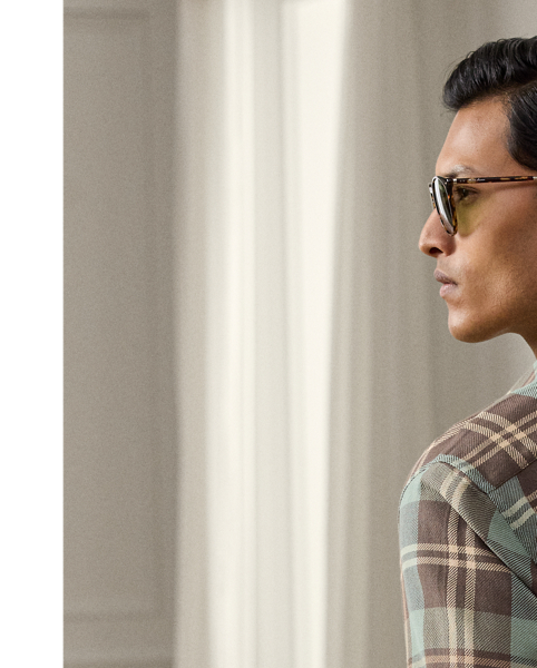 This utilitarian-inspired shirt demonstrates Purple Label's sartorial excellence with a custom-developed cotton fabric from Italy that is defined by a pronounced twill structure. Featuring a plaid pattern rendered in the season's palette, the style undergoes a specialised washing process that imparts remarkable softness while maintaining its distinctive character. Bespoke corozo buttons reflect our dedication to refined details.