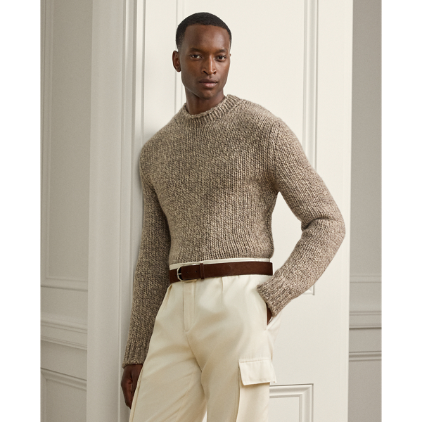 Masterfully crafted in Italy, this roll neck jumper exemplifies Purple Label's dedication to superior materials with its fine cashmere cloth. The refined composition demonstrates our commitment to exceptional quality and style.