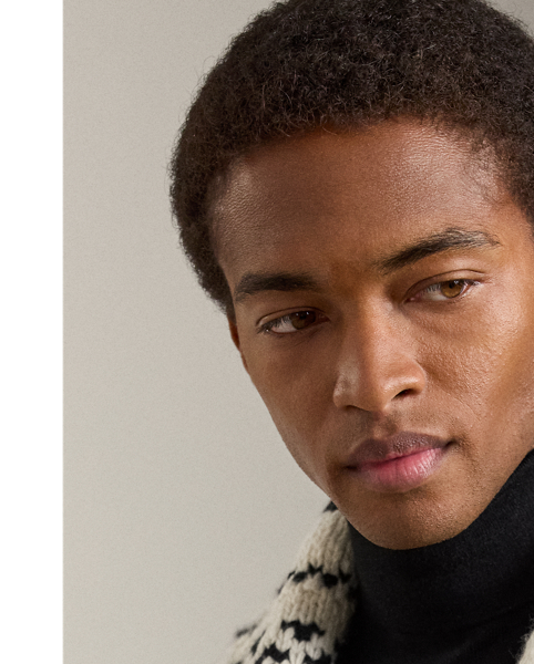 Purple Label's take on the classic cardigan achieves an intricate design with intarsia and jacquard knitting techniques as well as contrasting cashmere yarns.