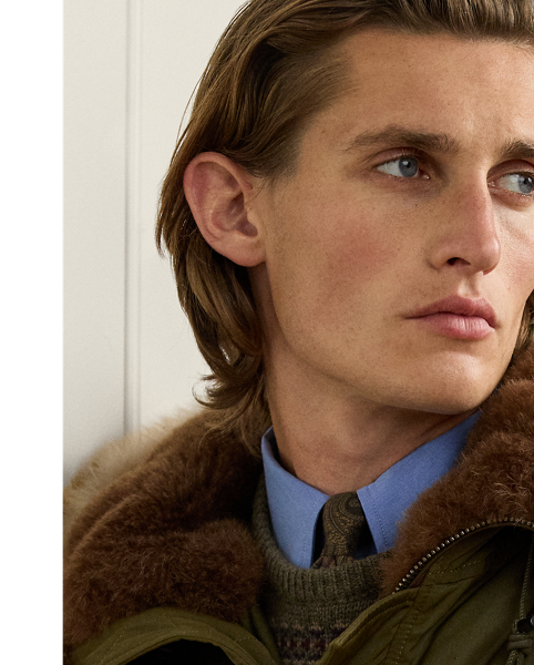 This Italian-made parka exemplifies Purple Label's dedication to superior craftsmanship with its custom-developed hardware, suede trim and vintage-inspired sateen fabric. Considered details such as its premium 750-fill-power down and shearling hood offer impeccable comfort to the medium-weight layer.