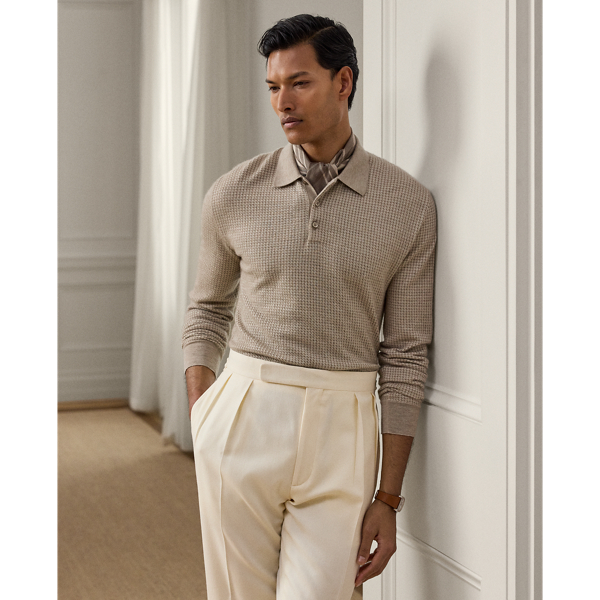 Uniting multiple fine-gauge cashmere yarns and a jacquard-knit technique, this Italian-crafted jumper is an exemplary take on tone and texture. The lightweight layer reimagines  Ralph Lauren Lauren's iconic Polo shirt silhouette and features considered details such as genuine mother-of-pearl buttons. Its classic houndstooth pattern draws inspiration from a woven fabric that is used in the Purple Label collection.