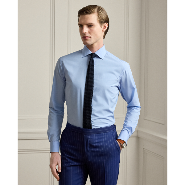 Crafted in Italy with fine cotton in an end-on-end weave, this shirt showcases  Ralph Lauren Lauren's commitment to unparalleled quality and timeless style. The custom-developed hue genuine mother-of-pearl buttons give it a sophisticated look that is purely Purple Label.