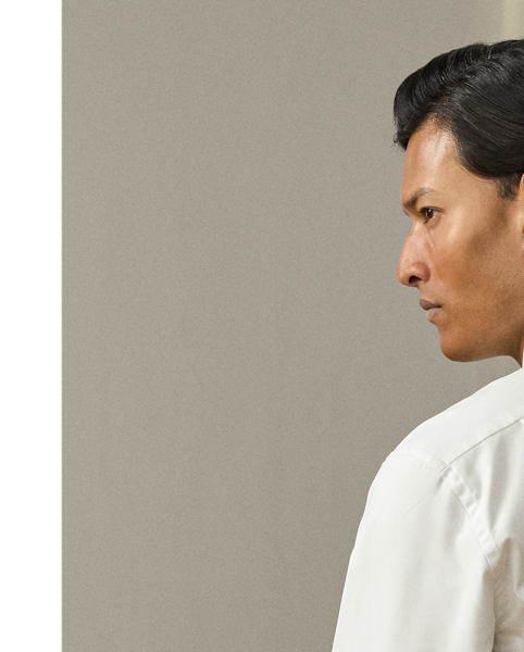 Crafted with premium cotton twill and enhanced with a crease-resistant treatment, this shirt represents the perfect fusion of modern innovation and timeless luxury. Each detail is thoughtfully considered, from the fabric's exceptional durability to the genuine mother-of-pearl buttons.