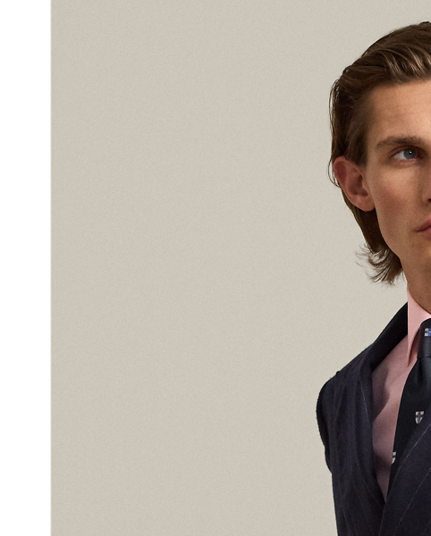 Meticulously crafted in Italy, this houndstooth shirt exemplifies sartorial excellence with its silky, super-fine cotton twill and genuine mother-of-pearl buttons. The precise compact weave of the cloth delivers superior colour brilliance, beautifully showcasing the bespoke hue, which was custom-developed with a storied Italian mill.