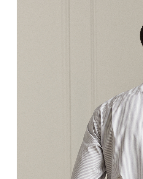 Meticulously crafted in Italy, this striped shirt exemplifies sartorial excellence through its silky, super-fine cotton twill and genuine mother-of-pearl buttons. The precise compact weave of the cloth delivers superior colour brilliance, beautifully showcasing the bespoke hue, which was custom-developed with a storied Italian mill.