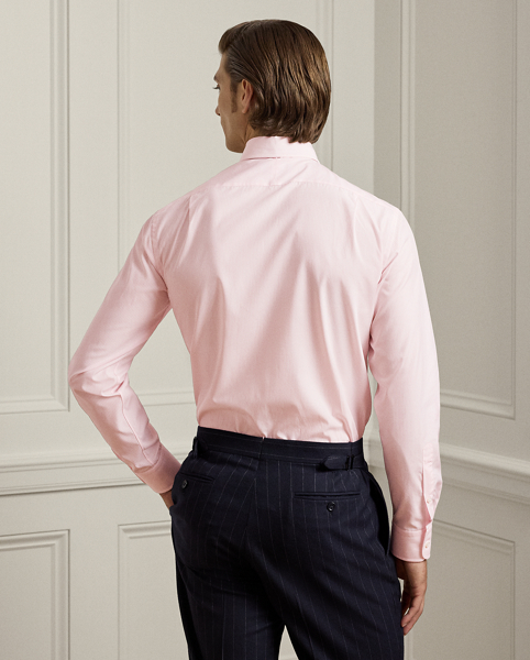 Meticulously crafted in Italy, this striped shirt exemplifies sartorial excellence through its silky, super-fine cotton twill and genuine mother-of-pearl buttons. The precise compact weave of the cloth delivers superior colour brilliance, beautifully showcasing the bespoke hue, which was custom-developed with a storied Italian mill.