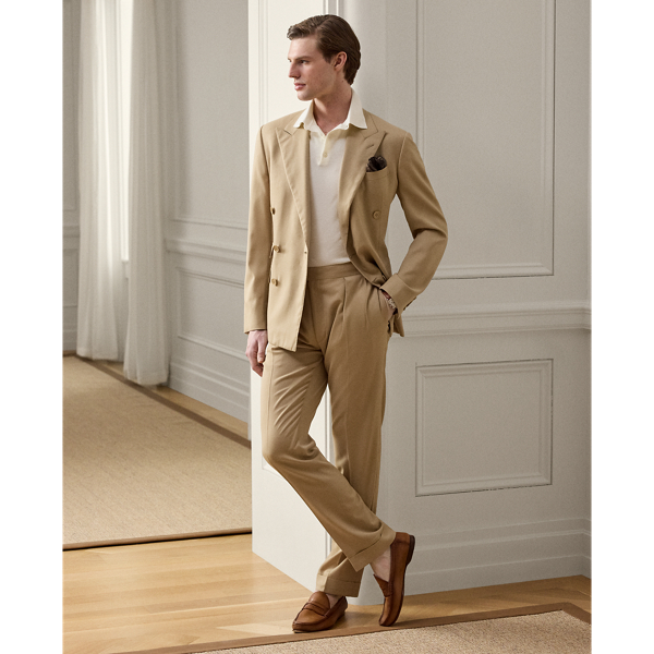 These double-pleated trousers are hand-tailored in Italy from wool gabardine, which is one of the most iconic fabrications personally selected by Mr Lauren. Custom-developed with a matte, brushed finish, the cloth offers a smooth and luxurious drape.