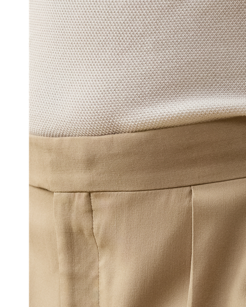 These double-pleated trousers are hand-tailored in Italy from wool gabardine, which is one of the most iconic fabrications personally selected by Mr Lauren. Custom-developed with a matte, brushed finish, the cloth offers a smooth and luxurious drape.