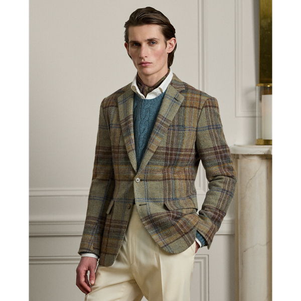 Hand-tailored in Italy, the Kent combines a lighter construction with fine canvassing and a soft shoulder to create a more natural profile. This version's wool tweed features the season's plaid pattern and was custom-developed with Ireland's Magee 1866, which has been a Ralph Lauren Lauren partner for more than 50 years. Being fibre-dyed, the special yarn used to craft the cloth offers an almost 3D effect and incredible dimension.