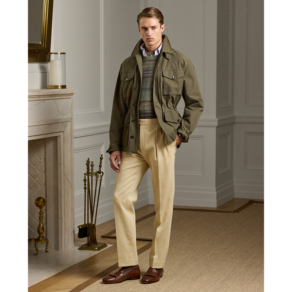 These double-pleated trousers are tailored by hand in Italy using a luxurious cotton-and-wool fabric that was custom-developed for  Ralph Lauren Lauren. Historically used in surplus garments, the vintage-inspired cavalry twill cloth offers a lightweight feel.